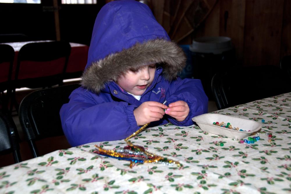 Stringing beads for the snowflake craft